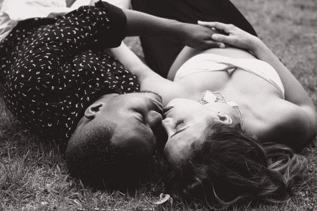 couple in love lying down bw